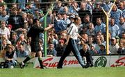 4 August 2001; Dublin manager Tom Carr is ordered off the pitch by linesman Michael Daly during the Bank of Ireland All-Ireland football Championship Quarter Final match between Dublin and Kerry at Semple Stadium in Thurles, Tipperary. Photo by Ray McManus/Sportsfile