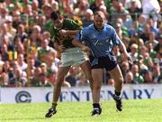 4 August 2001; Vinny Murphy of Dublin with Tom O'Sullivan of Kerry during the Bank of Ireland All-Ireland football Championship Quarter Final match between Dublin and Kerry at Semple Stadium in Thurles, Tipperary. Photo by Ray McManus/Sportsfile