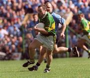 4 August 2001;Seamus Moynihan of Kerry in action against Vinnie Murphy of Dublin during the Bank of Ireland All-Ireland football Championship Quarter Final match between Dublin and Kerry at Semple Stadium in Thurles, Tipperary. Photo by Damien Eagers/Sportsfile