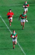 29 September 1996; Mayo captain Noel Connelly leads his side out onto the field ahead of the All-Ireland Senior Football Championship Final Replay match between Meath and Mayo at Croke Park in Dublin. Photo by Ray McManus/Sportsfile