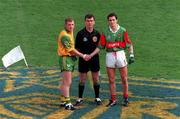 29 September 1996; Meath captain Tommy Dowd and Mayo captain Noel Connelly shake hands in front of referee Pat McEnaney during the All-Ireland Senior Football Championship Final Replay match between Meath and Mayo at Croke Park in Dublin. Photo by Ray McManus/Sportsfile