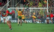 29 September 1996; Meath captain Tommy Dowd celebrates scoring his sides goal as Mayo's Pat Holmes, Kenneth Mortimer and goalkeeper John Madden look on during the All-Ireland Senior Football Championship Final Replay match between Meath and Mayo at Croke Park in Dublin. Photo by Ray McManus/Sportsfile