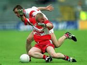 5 August 2001; Gareth Doherty of Derry in action against Eoin Gormley of Tyrone during the Bank of Ireland All-Ireland Senior Football Championship Quarter-Final match between Derry v Tyrone at St. Tiernach's Park in Clones, Monaghan. Photo by David Maher/Sportsfile