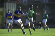 2 August 2001; Mark O'Riordan of Limerick is tackled by Kevin Mulryan of Tipperary during the Munster GAA U21 Hurling Championship Final match between Limerick and Tipperary at the Gaelic Grounds in Limerick. Photo by Matt Browne/Sportsfile