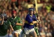 2 August 2001; Eoin Kelly of Tipperary is tackled by Kieran Bermingham of Limerick during the Munster GAA U21 Hurling Championship Final match between Limerick and Tipperary at the Gaelic Grounds in Limerick. Photo by Matt Browne/Sportsfile
