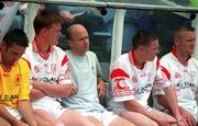 5 August 2001; Peter Canavan, third from left, sits on the bench after being sent off during the Bank of Ireland All-Ireland Senior Football Championship Quarter-Final match between Derry v Tyrone at St. Tiernach's Park in Clones, Monaghan. Photo by David Maher/Sportsfile