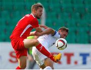 14 July 2016; Ger O'Brien of St Patrick's Athletic in action against Vladimir Korytko of Dinamo Minsk during the UEFA Champions League Second Qualifying Round 1st Leg match between Dinamo Minsk and St Patrick's Athletic at Traktor Stadium in Minsk, Belarus. Photo by Sportsfile