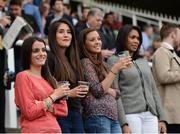 14 July 2016; Racegoers, from left, Maria Ruiz, Beatrice Fresno, and Noemi Navarro, all from Spain, and Laura Chacon, from Venezuela, enjoy their first-ever trip to Leopardstown Racecourse during the Bulmers Evening Meeting at Leopardstown in Dublin. Photo by Cody Glenn/Sportsfile