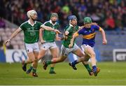 14 July 2016; Josh Keane of Tipperary in action against Mike Casey, second from left, Ronan Lynch, Cian Lynch, left, of Limerick during the Bord Gáis Energy Munster U21 Hurling Championship Semi-Final match between Tipperary and Limerick at Semple Stadium in Thurles, Co Tipperary. Photo by Stephen McCarthy/Sportsfile