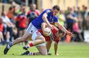 16 July 2016; Brian O'Driscoll of Cork is tackled by James McGivney of Longford during the GAA Football All-Ireland Senior Championship Round 3B match between Longford and Cork at Glennon Brothers Pearse Park in Longford. Photo by Ramsey Cardy/Sportsfile