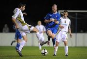 30 August 2010; Stephen O'Flynn, Limerick, in action against Shaun Maher, left, and Ollie Cahill, Sporting Fingal. FAI Ford Cup Fourth Round Replay, Limerick v Sporting Fingal, Jackman Park, Limerick. Picture credit: Diarmuid Greene / SPORTSFILE