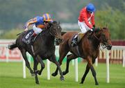 4 September 2010; Lillie Langtry, left, with Johnny Murtagh up, comes neck and neck alongside Spacious, with Kieren Fallon up, on their way to winning the Coolmore Fusaichi Pegasus Matron Stakes (Group 1). Leopardstown Racecourse, Dublin. Picture credit: Brendan Moran / SPORTSFILE