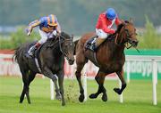 4 September 2010; Lillie Langtry, left, with Johnny Murtagh up, comes neck and neck alongside Spacious, with Kieren Fallon up, on their way to winning the Coolmore Fusaichi Pegasus Matron Stakes (Group 1). Leopardstown Racecourse, Dublin. Picture credit: Brendan Moran / SPORTSFILE