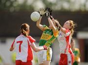 4 September 2010; Louise Galvin, Kerry, in action against Lynda Donnelly and Shannon Quinn, Tyrone. TG4 Ladies Football All-Ireland Senior Championship Semi-Final, Tyrone v Kerry, Ballymahon, Longford. Picture credit: Oliver McVeigh / SPORTSFILE