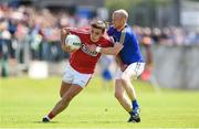 16 July 2016; Mark Collins of Cork is tackled by Dermot Brady of Longford during the GAA Football All-Ireland Senior Championship Round 3B match between Longford and Cork at Glennon Brothers Pearse Park in Longford. Photo by Ramsey Cardy/Sportsfile