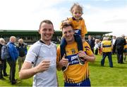 16 July 2016; David Turbidy and Enda Coughlin and daughter Abbey of Clare celebrate after the GAA Football All-Ireland Senior Championship Round 3A match between Sligo and Clare at Markievicz Park in Sligo.  Photo by Oliver McVeigh/Sportsfile