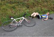 16 July 2016; Conor Leech of Cycling Leinster collapses after finishing Stage 5 of the 2016 Scott Bicycles Junior Tour of Ireland, Gallows Hill, Co. Clare. Picture credit: Stephen McMahon/SPORTSFILE