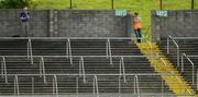 16 July 2016; A Cavan supporter and a stadium steward watch the GAA Football All-Ireland Senior Championship Round 3A match between Cavan and Derry at Kingspan Breffni Park in Cavan. Photo by Brendan Moran/Sportsfile