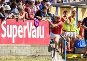 16 July 2016; Alan O'Connor of Cork removes himself from the advertising board after getting stuck during the GAA Football All-Ireland Senior Championship Round 3B match between Longford and Cork at Glennon Brothers Pearse Park in Longford. Photo by Ramsey Cardy/Sportsfile
