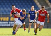 16 July 2016; Paul McGee of Longford is tackled by Sean Powter of Cork during the GAA Football All-Ireland Senior Championship Round 3B match between Longford and Cork at Glennon Brothers Pearse Park in Longford. Photo by Ramsey Cardy/Sportsfile