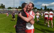 16 July 2016; Ciarán Mullan of Derry celebrates with manager Damien Barton after the GAA Football All-Ireland Senior Championship Round 3A match between Cavan and Derry at Kingspan Breffni Park in Cavan. Photo by Brendan Moran/Sportsfile