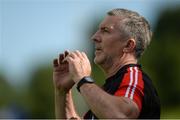 16 July 2016; Derry manager Damien Barton watches the final moments of the GAA Football All-Ireland Senior Championship Round 3A match between Cavan and Derry at Kingspan Breffni Park in Cavan. Photo by Brendan Moran/Sportsfile