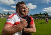 16 July 2016; Emmett McGuckin of Derry celebrates with manager Damien Barton after the GAA Football All-Ireland Senior Championship Round 3A match between Cavan and Derry at Kingspan Breffni Park in Cavan. Photo by Brendan Moran/Sportsfile