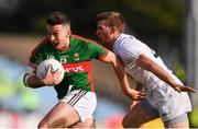 16 July 2016; Evan Regan of Mayo in action against Ollie Lyons of Kildare during the GAA Football All-Ireland Senior Championship Round 3B match between Mayo and Kildare at Elverys MacHale Park in Castlebar, Mayo. Photo by Stephen McCarthy/Sportsfile