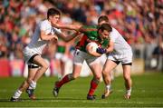 16 July 2016; Andy Moran of Mayo in action against David Hyland, left, and Morgan O'Flaherty of Kildare during the GAA Football All-Ireland Senior Championship Round 3B match between Mayo and Kildare at Elverys MacHale Park in Castlebar, Mayo. Photo by Stephen McCarthy/Sportsfile