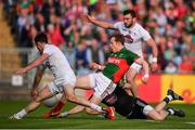 16 July 2016; Donal Vaughan of Mayo in action against Kildare players, from left, Eoin Doyle, Mark Donnellan and Fergal Conway during the GAA Football All-Ireland Senior Championship Round 3B match between Mayo and Kildare at Elverys MacHale Park in Castlebar, Mayo. Photo by Stephen McCarthy/Sportsfile