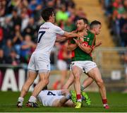 16 July 2016; Emmet Bolton of Kildare and Keith Higgins of Mayo tussle after Evan Regan of Mayo scored their side's first goal during the GAA Football All-Ireland Senior Championship Round 3B match between Mayo and Kildare at Elverys MacHale Park in Castlebar, Mayo. Photo by Stephen McCarthy/Sportsfile