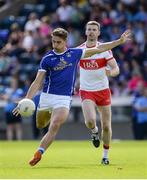 16 July 2016; Killian Clarke of Cavan in action against Niall Holly of Derry during the GAA Football All-Ireland Senior Championship Round 3A match between Cavan and Derry at Kingspan Breffni Park in Cavan. Photo by Brendan Moran/Sportsfile