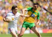 17 July 2016; Ronan O'Neill of Tyrone  in action against Rory Kavanagh of Donegal during the Ulster GAA Football Senior Championship Final match between Donegal and Tyrone at St Tiernach's Park in Clones, Co Monaghan. Photo by Oliver McVeigh/Sportsfile