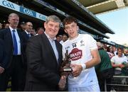 17 July 2016; Pictured is Pat O’Doherty, Chief Executive of ESB, proud sponsor of the Electric Ireland GAA All-Ireland Minor Championships, presenting captain Brian McLoughlin from Kildare with the Player of the Match award for his outstanding performance in the Electric Ireland Leinster Minor Football Championship Final. Throughout the Championship fans can follow the conversation, support the Minors and be a part of something major through the hashtag #GAAThisIsMajor. Croke Park in Dubin. Photo by Ray McManus / SPORTSFILE