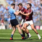 17 July 2016; Philly McMahon of Dublin tussles with John Heslin and Paul Sharry of Westmeath during the Leinster GAA Football Senior Championship Final match between Dublin and Westmeath at Croke Park in Dubin. Photo by David Maher/Sportsfile