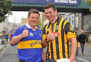 5 September 2010; Tipperary and Kilkenny supporters, from left, Mark Hickey, from Boherlathan, Co. Tipperary, and Tommy Kent, from Kilmacow, Co. Kilkenny, show their support for their teams before the match. GAA Hurling All-Ireland Senior Championship Final, Kilkenny v Tipperary, Croke Park, Dublin. Picture credit: Barry Cregg / SPORTSFILE