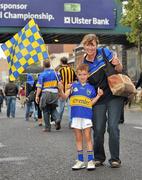 5 September 2010; Tipperary supporter Joeseph Dooley Mcinerney, age 6, attending his first All-Ireland final with Joan Dooley, from Silvermines, Co. Tipperary, show their support for their team before the match. GAA Hurling All-Ireland Senior Championship Final, Kilkenny v Tipperary, Croke Park, Dublin. Picture credit: Barry Cregg / SPORTSFILE