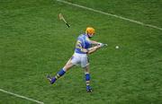 5 September 2010; Lar Corbett of Tipperary scores his and his side's second goal despite the flying hurley of John Tennyson of Kilkenny, for which Tennyson was shown a yellow card during the GAA Hurling All-Ireland Senior Championship Final match between Kilkenny and Tipperary at Croke Park in Dublin. Photo by Brendan Moran/Sportsfile