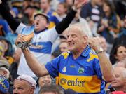 5 September 2010; A Tipperary supporter celebrates victory at the end of the game. GAA Hurling All-Ireland Senior Championship Final, Kilkenny v Tipperary, Croke Park, Dublin. Picture credit: David Maher / SPORTSFILE