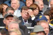 5 September 2010; An Taoiseach Brian Cowen T.D., views the match day programme before the start of the game between Tipperary and Kilkenny. GAA Hurling All-Ireland Senior Championship Final, Kilkenny v Tipperary, Croke Park, Dublin. Picture credit: David Maher / SPORTSFILE
