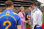 5 September 2010; President of Ireland Mary McAleese shakes hands with Tipperary goalkeeper Brendan Cummins after been introduced by team captain Eoin Kelly before the start of the game. GAA Hurling All-Ireland Senior Championship Final, Kilkenny v Tipperary, Croke Park, Dublin. Picture credit: David Maher / SPORTSFILE