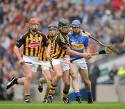 5 September 2010; JJ Delaney, Kilkenny, gets in to dispossess Eoin Kelly, Tipperary. GAA Hurling All-Ireland Senior Championship Final, Kilkenny v Tipperary, Croke Park, Dublin. Picture credit: Ray McManus / SPORTSFILE