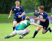5 September 2010; Leinster's Anthony Slein goes to hand off the incoming tackle. Under-19 Friendly - Exiles v Leinster, Sunbury on Thames, Middlesex, England. Picture credit: SPORTSFILE