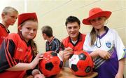 6 September 2010; Martin Clarke, Down, along with Cliodhna Maher and Aimee O Hanlon, during a fans open night ahead of their upcoming GAA Football All-Ireland Championship final against Cork. Abbey Grammar School, Newry, Co. Down. Picture credit: Oliver McVeigh / SPORTSFILE