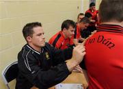 6 September 2010; Paul McComiskey, Down, signs an autograph during a fans open night ahead of their upcoming GAA Football All-Ireland Championship final against Cork. Abbey Grammar School, Newry, Co. Down. Picture credit: Oliver McVeigh / SPORTSFILE
