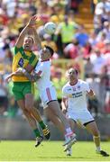 17 July 2016; Michael Murphy of Donegal in action against Cathal McCarron of Tyrone during the Ulster GAA Football Senior Championship Final match between Donegal and Tyrone at St Tiernach's Park in Clones, Co Monaghan. Photo by Ramsey Cardy/Sportsfile
