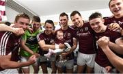 17 July 2016; Finian Hanley, with his daughter Freya, age 5 months, and his Galway team-mates celebrate following the Connacht GAA Football Senior Championship Final Replay match between Galway and Roscommon at Elverys MacHale Park in Castlebar, Co Mayo. Photo by Stephen McCarthy/Sportsfile