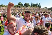 17 July 2016; Darren McCurry of Tyrone celebrates with supporters following the Ulster GAA Football Senior Championship Final match between Donegal and Tyrone at St Tiernach's Park in Clones, Co Monaghan. Photo by Ramsey Cardy/Sportsfile