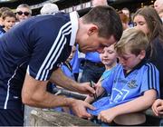17 July 2016; Nine year old Sean O'Brien, from Navan, has his jersey signed by Dublin Captain Stephen Cluxton after the Leinster GAA Football Senior Championship Final match between Dublin and Westmeath at Croke Park in Dubin. Photo by Ray McManus/Sportsfile