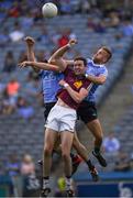 17 July 2016; Darragh Daly of Westmeath in action against Dublin players Denis Bastic, left, and Jonny Cooper during the Leinster GAA Football Senior Championship Final match between Dublin and Westmeath at Croke Park in Dubin. Photo by Ray McManus/Sportsfile
